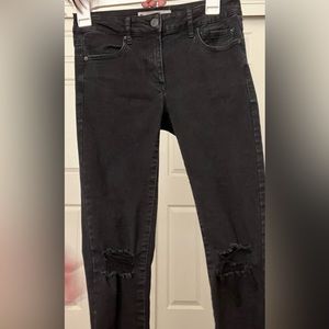 Black distressed skinny jeans, garage, in good shape, with pockets, size 03